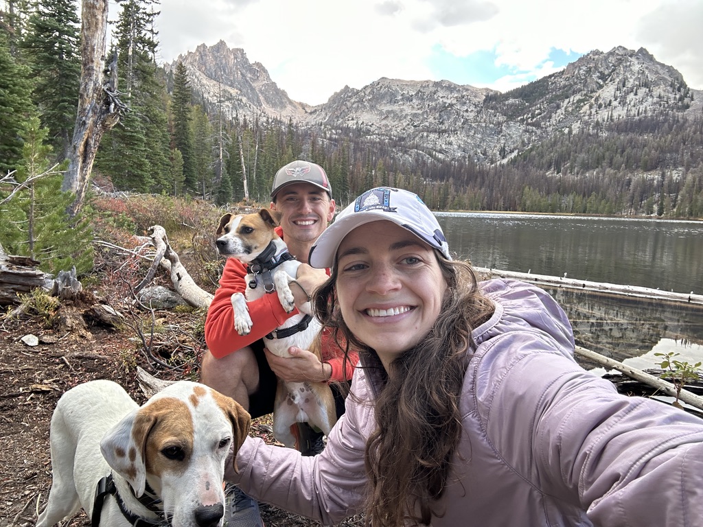 The whole family by a mountain lake